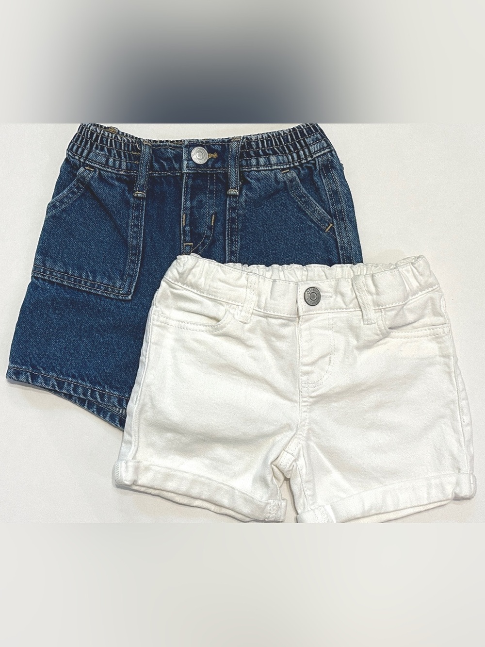 Bundle of 1 blue Old Navy jean shorts and 1 OshKosh white jean shorts. 4T girls